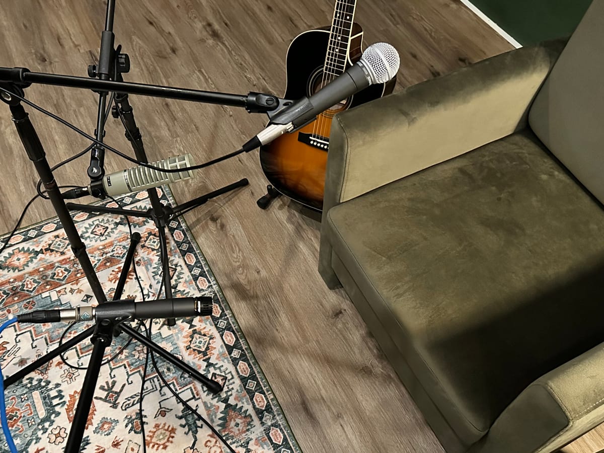 Microphones set up to capture acoustic guitar tracks during a recent recording session 